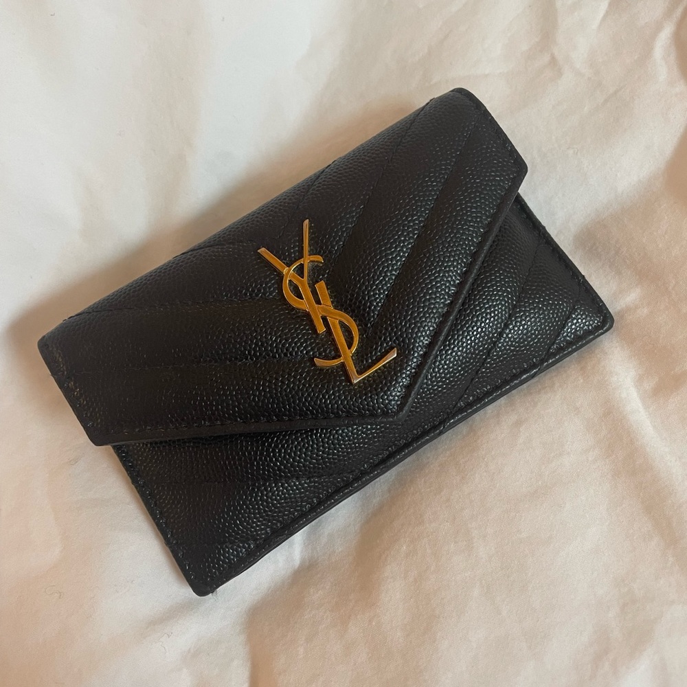 SAINT LAURENT
Monogramme small quilted textured-leather wallet